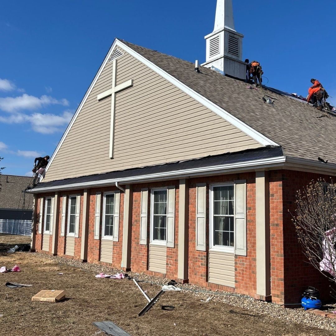 Church roof replacement underway by a commercial roofing St Louis crew