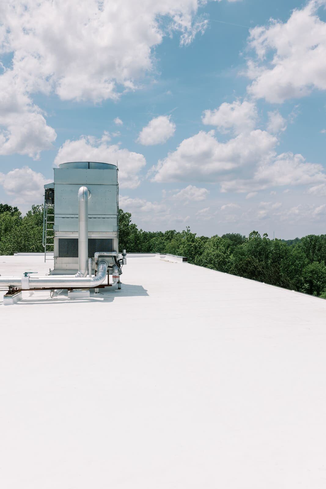 Rooftop HVAC unit sealed by a commercial roofing St Louis contractor